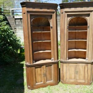 Matching pair 18th Century Narrow Barrel Back Corner Cupboards